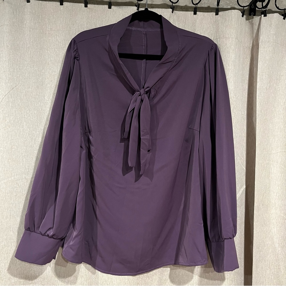 Purple tunic blouse with bow tie